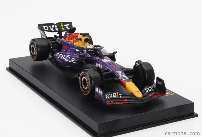 Bburago Red bull F1 Rb19 Team Oracle Red Bull Racing N 1 Víťaz majstrovstiev sveta Las Vegas Usa Gp 2023 Max Verstappen - s pilotom a vitrínou 1:43 Purple Yellow Red