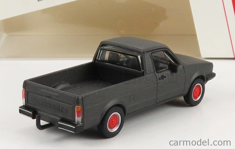 Schuco Volkswagen Caddy Pick-up otvorený 1982 1:64 sivá