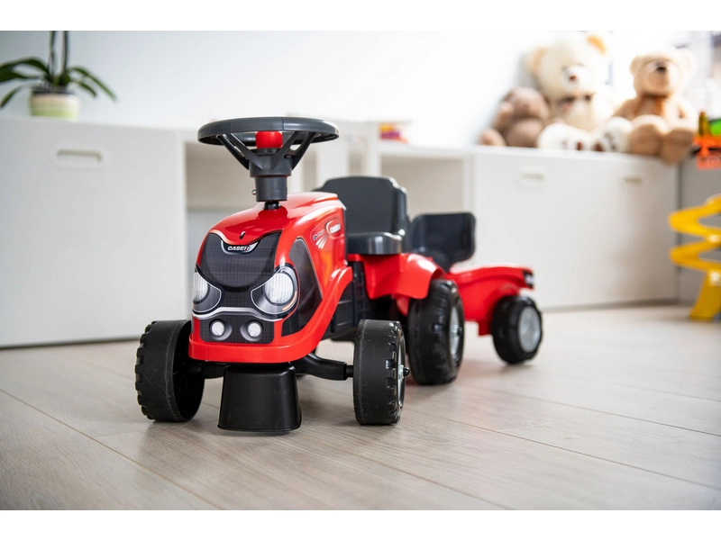 FALK – Detské odrážadlo Baby Case IH s vlečkou, lopatkou a hrabličkami