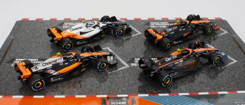 Bburago Mclaren F1 Set 4x – Team Mclaren Mcl36 N 4 Abu Dhabi Gp 2022 – Mcl60 N 4 Singapore Gp - Monaco Gp – British Gp 2023 Lando Norris 1:43 oranžová čierna biela