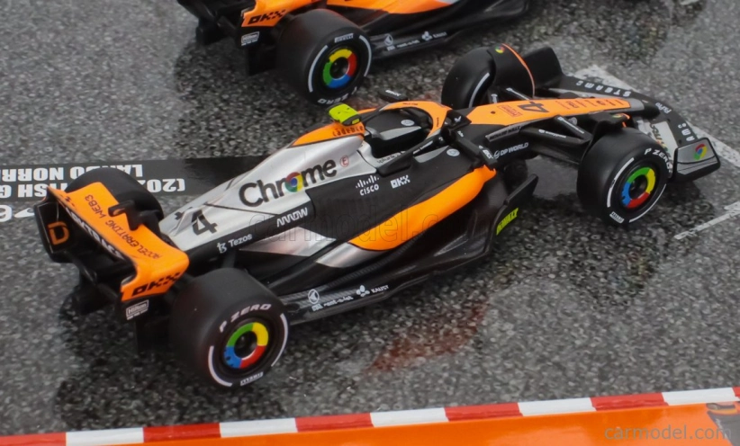 Bburago Mclaren F1 Set 4x – Team Mclaren Mcl36 N 4 Abu Dhabi Gp 2022 – Mcl60 N 4 Singapore Gp - Monaco Gp – British Gp 2023 Lando Norris 1:43 oranžová čierna biela