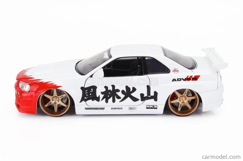 Jada Nissan Skyline Gt-r (r34) Advan 2002 With Street Fighter Ryu Figure 1:24 Bílá Červená