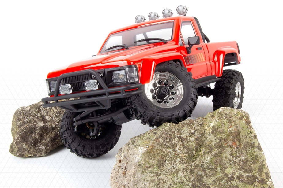 Venture18 Flux 1985 Toyota Hilux SR5 - červená
