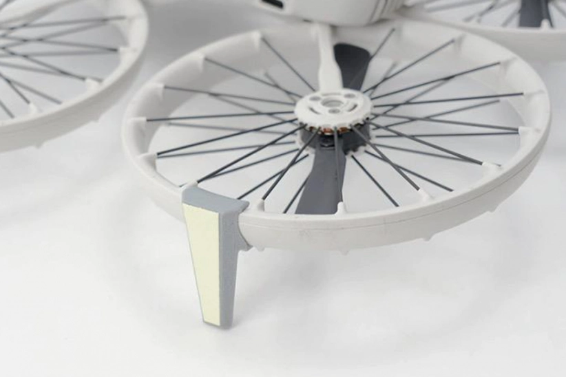 DJI Flip - Zadní podvozek s noční svítící nálepkou