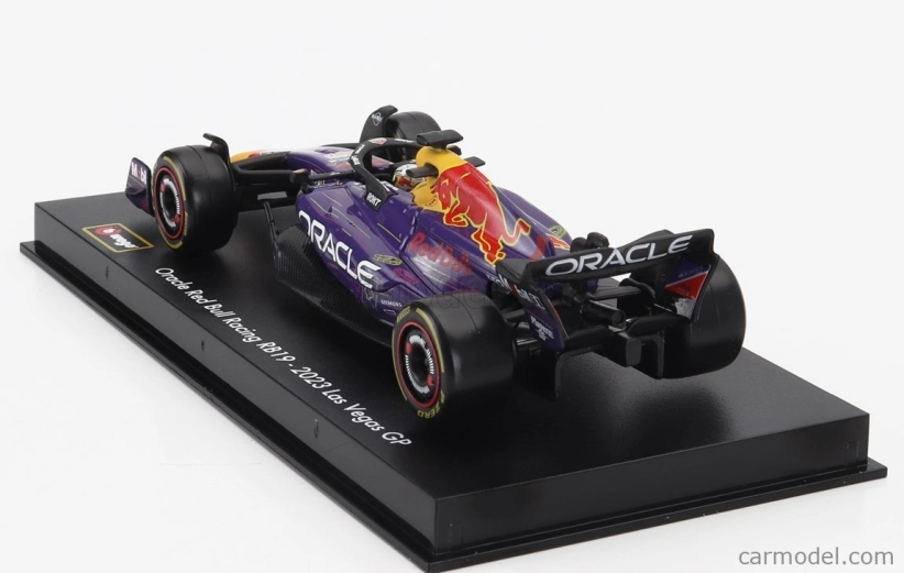 Bburago Red bull F1 Rb19 Team Oracle Red Bull Racing N 1 Víťaz majstrovstiev sveta Las Vegas Usa Gp 2023 Max Verstappen - s pilotom a vitrínou 1:43 Purple Yellow Red