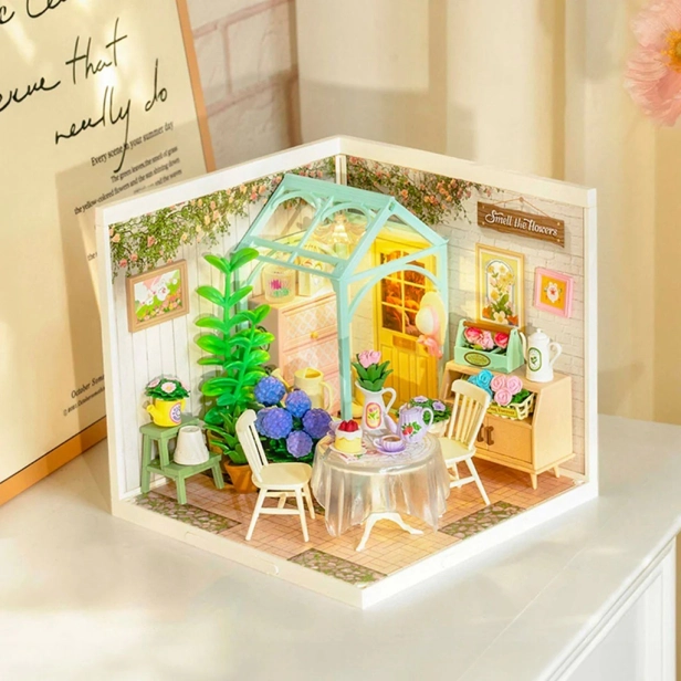 RoboTime Miniatura domečku Posezení s čajem v kvetoucí zahradě