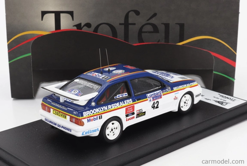Trofeu Ford england Sierra Rs Cosworth N 42 Rally Rac Lombard 1986 Phil Collins - Bryan Thomas 1:43 Modrá biela