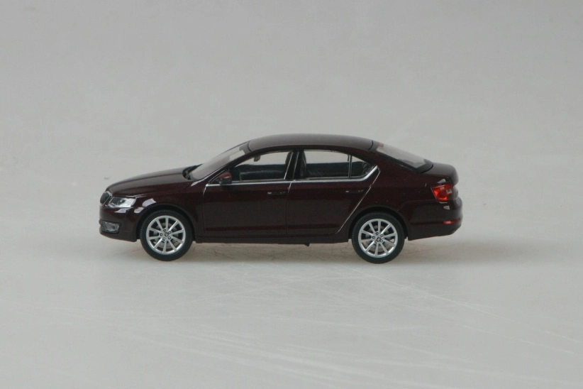 Abrex Škoda Octavia III (2012) 1:43 – rosso brunello metalíza