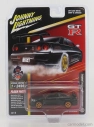 Johnny lightning Nissan Skyline Gt-r (bnr34) 1999 1:64 čierna zlatá
