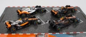 Bburago Mclaren F1 Set 4x – Team Mclaren Mcl36 N 4 Abu Dhabi Gp 2022 – Mcl60 N 4 Singapore Gp - Monaco Gp – British Gp 2023 Lando Norris 1:43 oranžová čierna biela