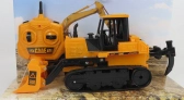 Re-el toys Case-ih Titan Ruspa Cingolata Tractor 2013 1:24 Žlutá Černá